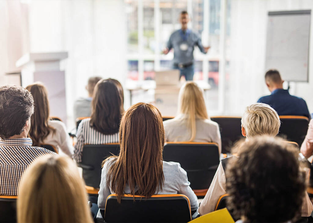 An audience of people at a conference